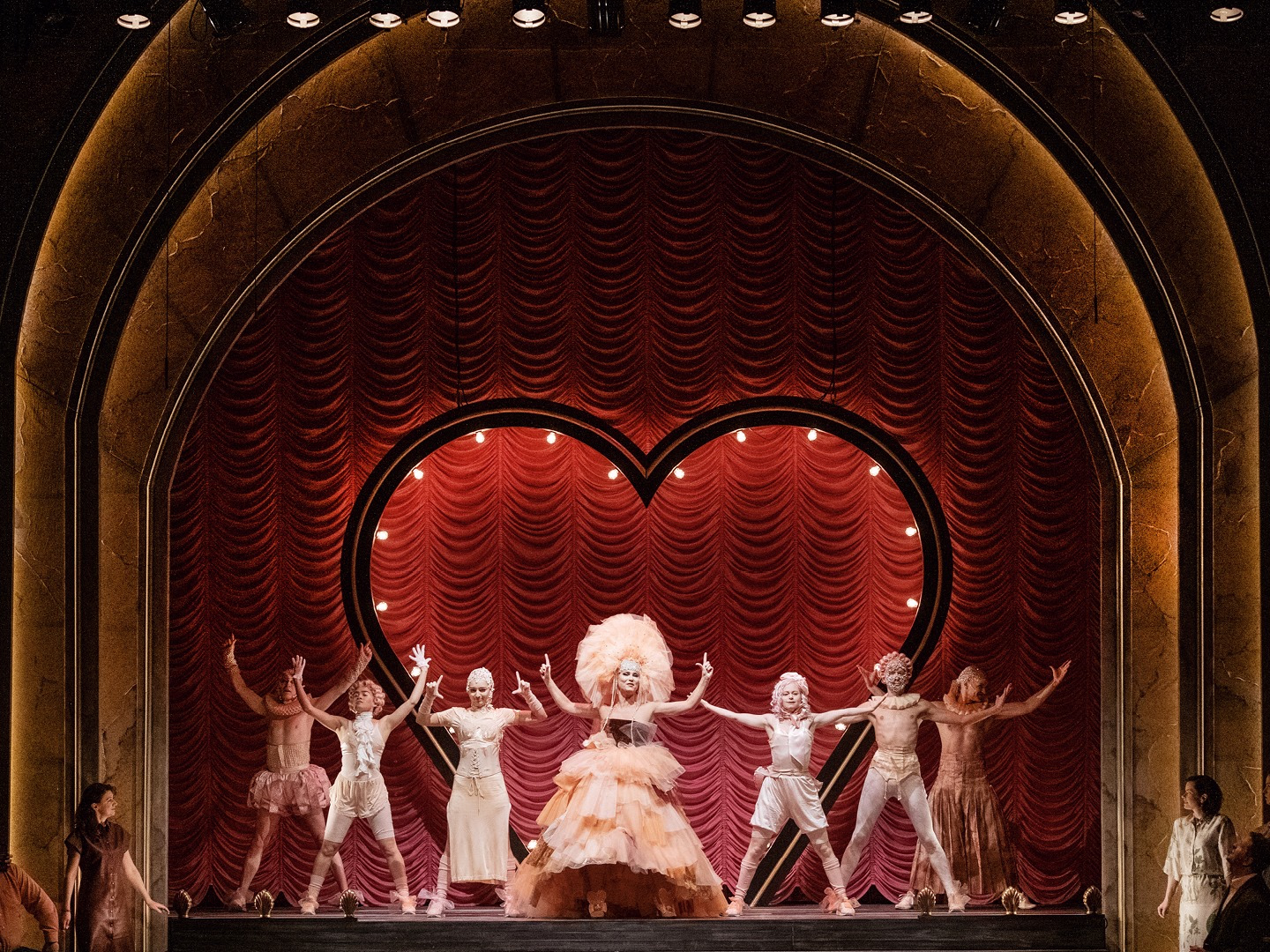 People dancing on stage.